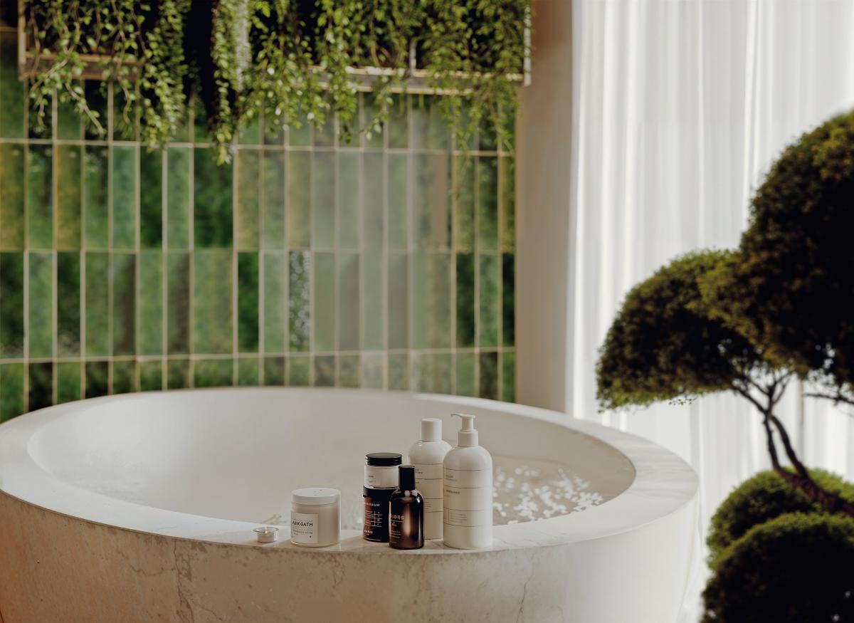 3D render of a circular bathtub with spa products, lush plants, and vertical green tiles in a modern bathroom scene.